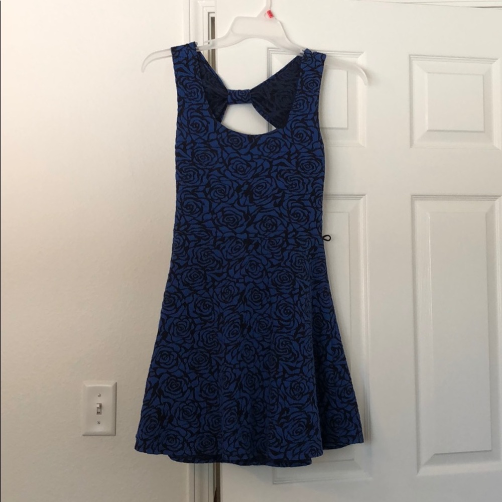 Royal blue open back dress.